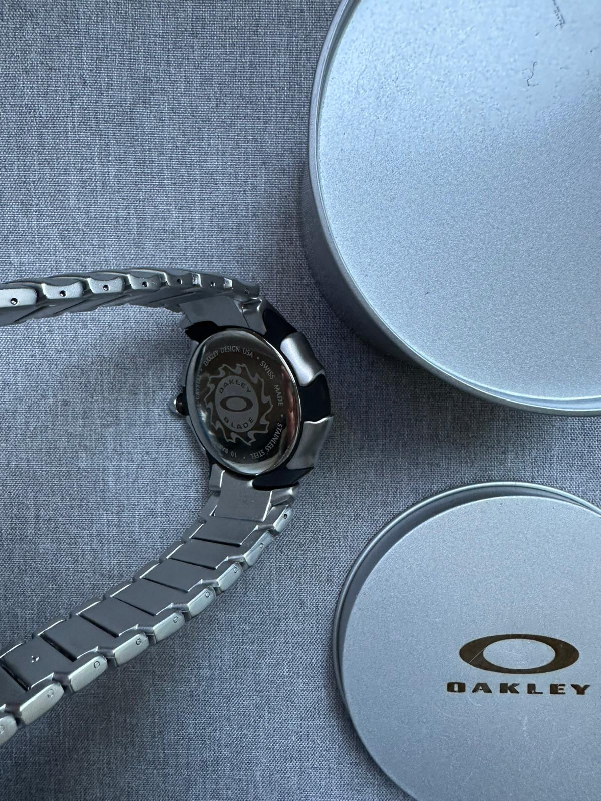 Oakley Blade Watch: Silver brushed Stainless Steel with Black Dial, Swiss Movement