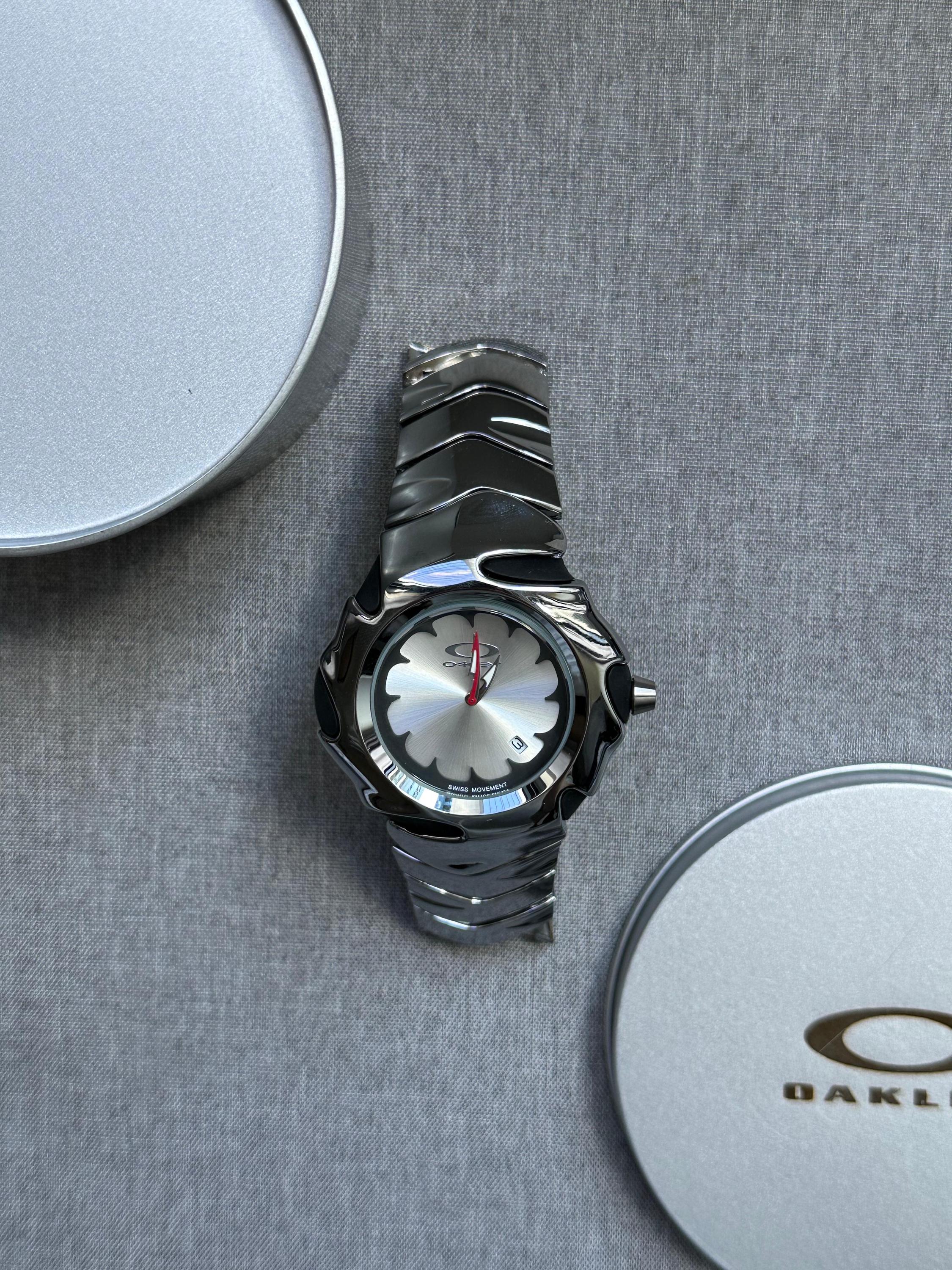 Oakley Blade Watch – White Dial Silver SHINY Stainless Steel with Smooth Reflective Strap, Swiss Movement, Collectible Men’s Watch